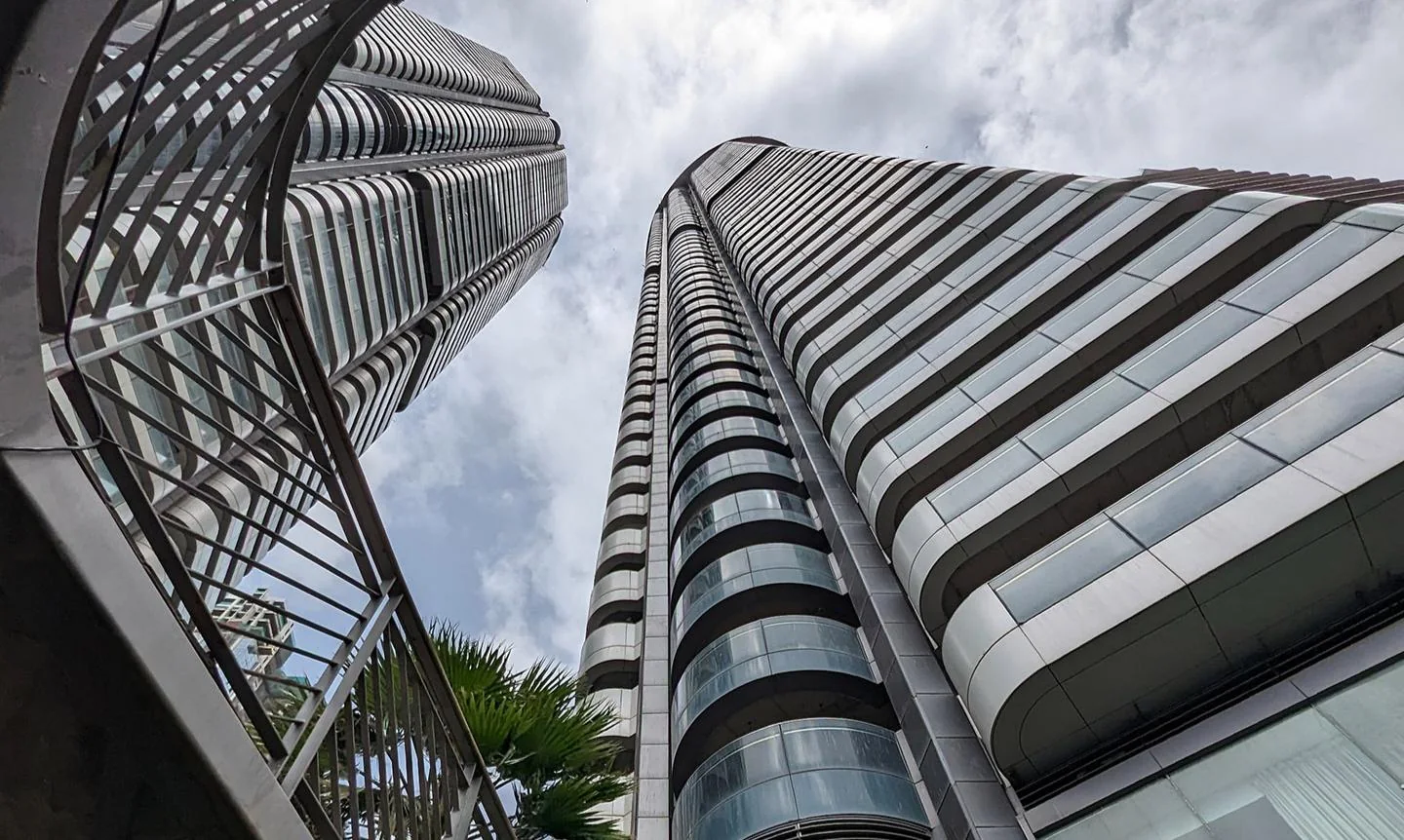 Omkar 1973, Worli — curved glass façade by Aluplex
